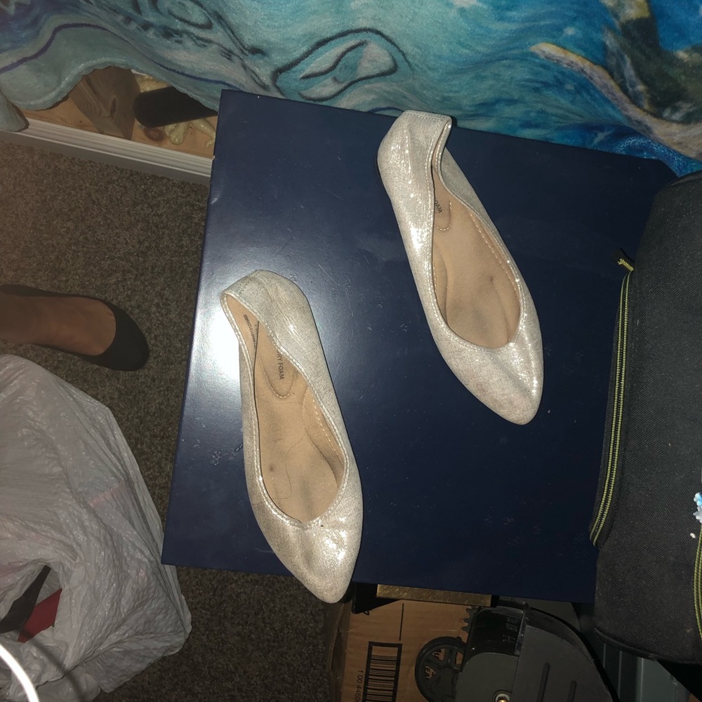 Women’s tan and silver pointed toed flats